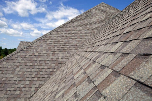 What's the average lifespan of an asphalt shingle roof in Minnesota's climate?